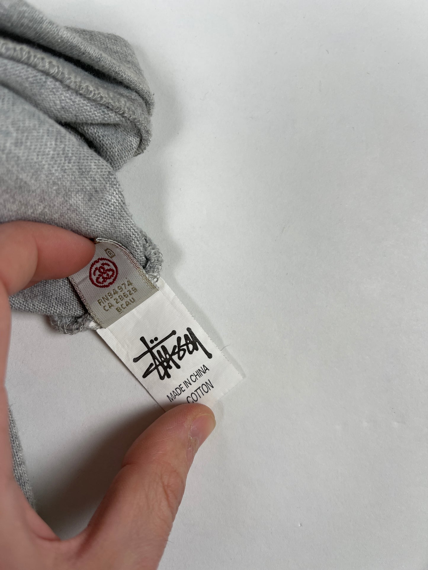 Crewneck Stüssy gris et kaki satiné